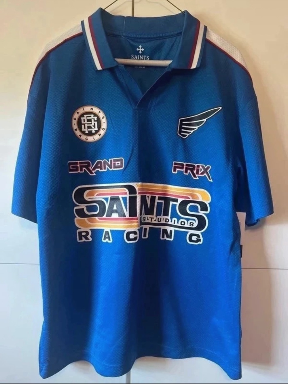 Saints Racing Blue Grand Prix Performance Polo
